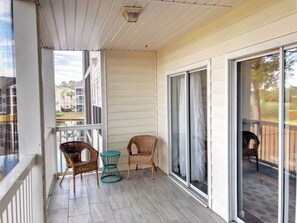 Balcony overlooks pond and golf course