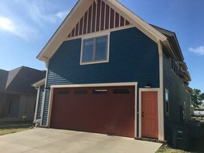 The apartment entrance is next to the garage-private/separated from main house.