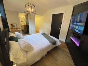 The master-suite is a cozy getaway with its own private bathroom.