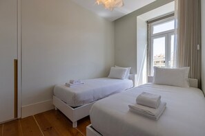 Clean and bright, this bedroom #2 has two single beds #bedroom #comfort #home