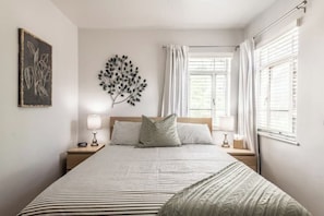 Memory foam topped mattress, luxe cotton bedding.