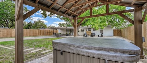 Indulge in our backyard oasis. Relax in the hot tub, savor the seclusion of privacy fencing, and unwind in the covered gazebo. Your ultimate escape starts here!