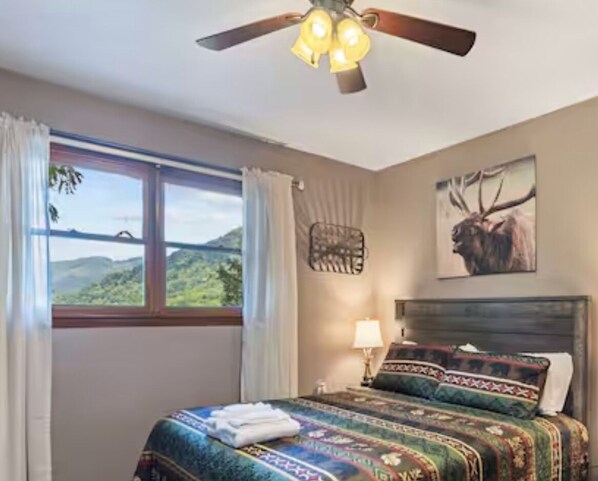 primary king bedroom is large with an ensuite full bathroom