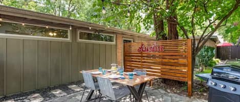 Outdoor patio with a grill