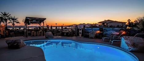 Pool Area with BBQ, Boat Bar and Lounge Chairs