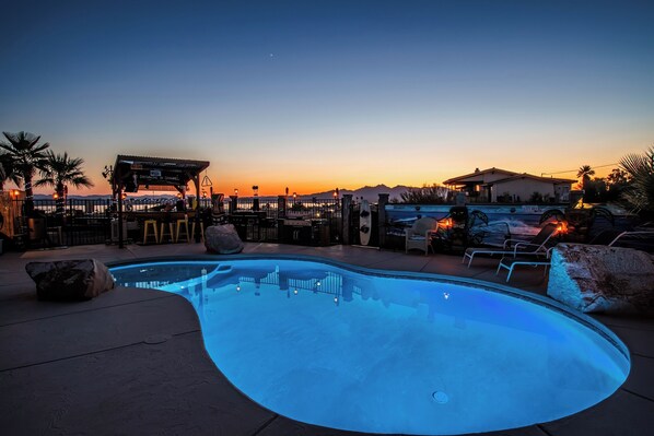 Pool Area with BBQ, Boat Bar and Lounge Chairs