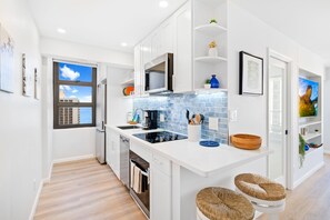 The fully equipped kitchen is perfect for your culinary needs!