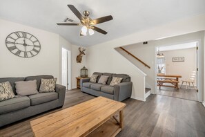 Living room with a view into the dining room