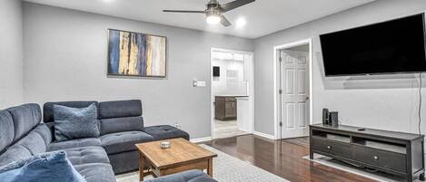 Step into relaxation in this inviting living room haven.