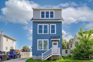 High Tide Hideaway stands bright and beautiful in the heart of Chincoteague Island.