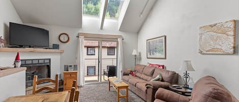 Vaulted ceilings with views of ski area