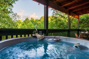 Let everything fade away as you sit and relax in the hottub overlooking the mountain views.