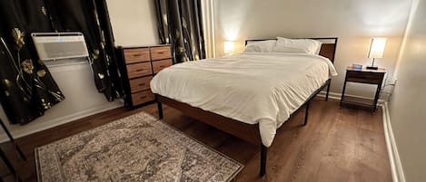 Bedroom, Queen Dreamcloud mattress, alarm, sound machine, wardrobe.
