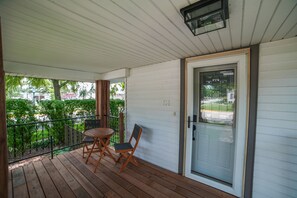 Front porch faces the park.  Great place to enjoy your coffee!