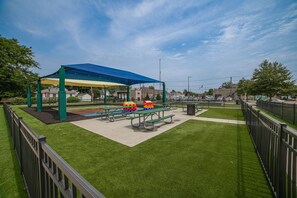 Amazing park across the street. Jumpy pillow, zip line and splash pad.