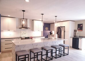 Kitchen featuring 10ft quartzite counter top