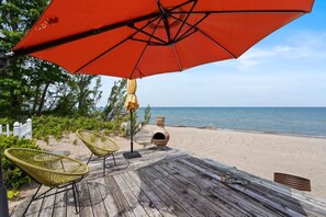 Sit and listen to the waves, or enjoy the sandy beachfront!