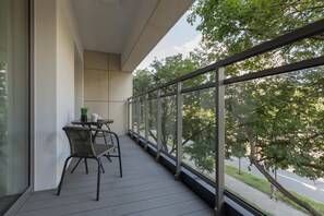 Balcony with garden furniture.