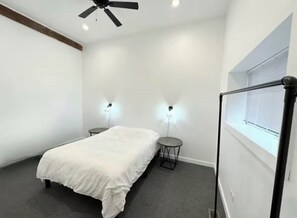 Queen bed with 43” smart TV