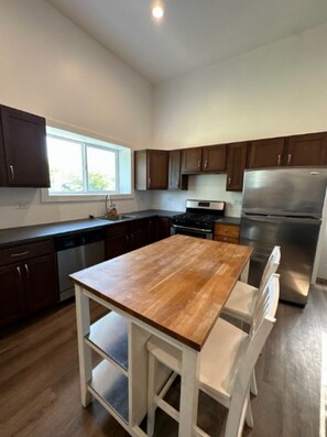{KITCHEN} Stainless steel appliances.