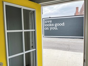 View of directly across from the main entrance. Murals = fun vibes.