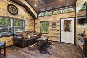 Plenty of natural light and ceiling fan in living room