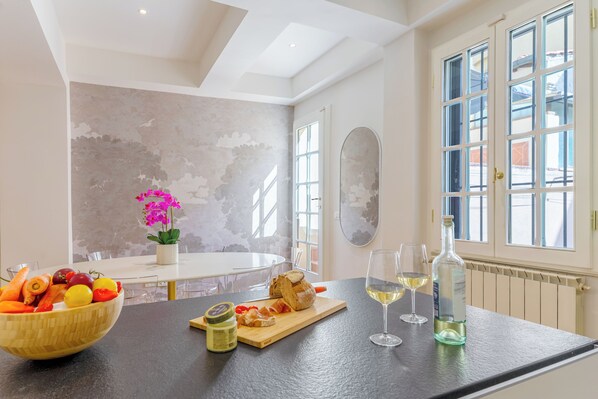 full modern kitchen opens to dining space