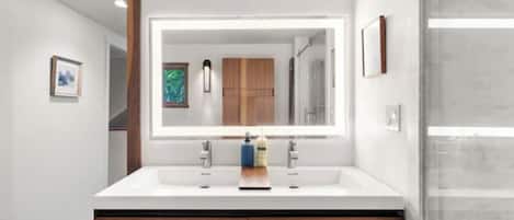 Bright modern bathroom with plenty of light to get ready for the day