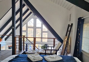 Loft master bedroom open concept.