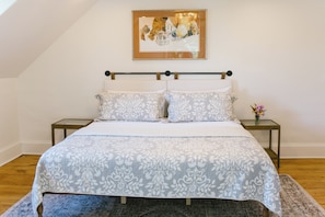 Featuring a plush queen bed, soft linens, and tasteful artwork, Sarah's Room blends comfort and charm—an inviting space for your Boothbay Harbor retreat at the historic Greenleaf Inn.