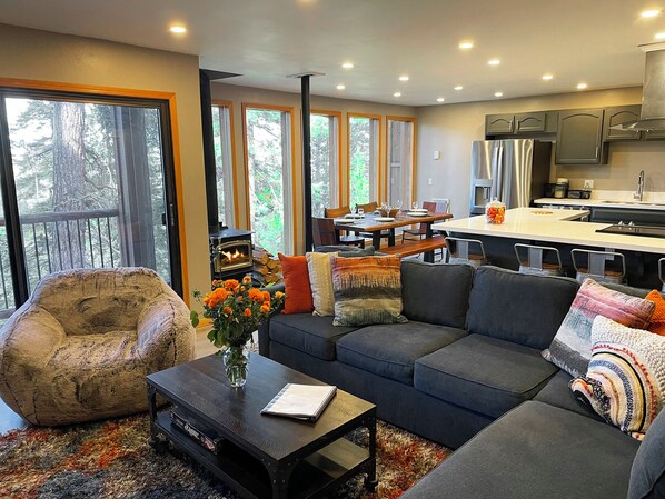 1st floor.  Open floor plan.  Living Room, Kitchen, Dining Room, wall of windows
