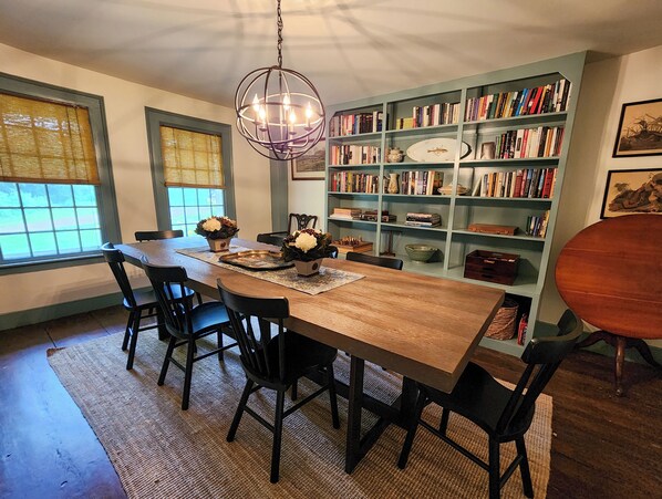 Dining room seating for 10; library and games