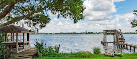 Gazebo area with a swing, seating area & propane grill!  Boat dock & kayaks for guest's use!