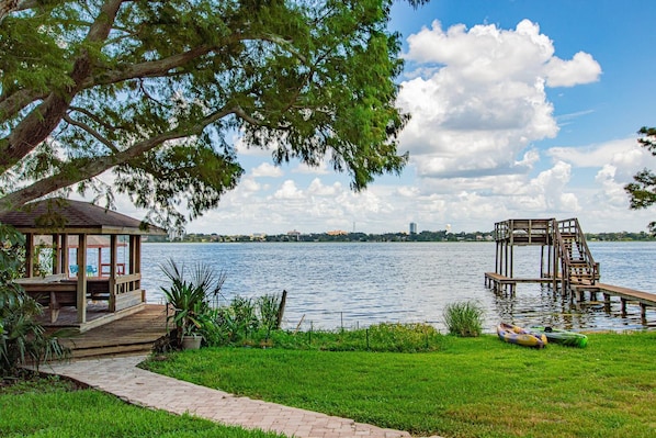 Gazebo area with a swing, seating area & propane grill!  Boat dock & kayaks for guest's use!