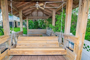 Gazebo area with a swing to enjoy the breezes off of Lake Howard!