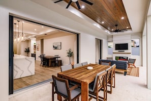 Lanai, Motorized Screens, BBQ, Outdoor Living and Dining.
