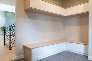 Mudroom with custom storage cabinets