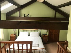 The original beams in the main bedroom from the dressing area