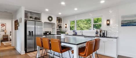 Island seating and stainless steel appliances
