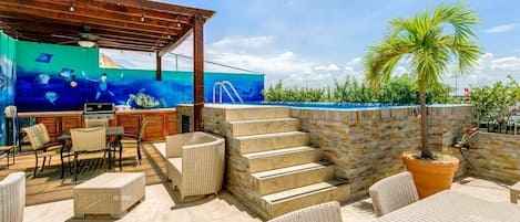 Enjoy the private rooftop lounge & pool after a day of sightseeing! Ahhh!