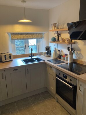 Fully fitted kitchen. Welcome pack containing coffee, tea, milk and crumpets. 