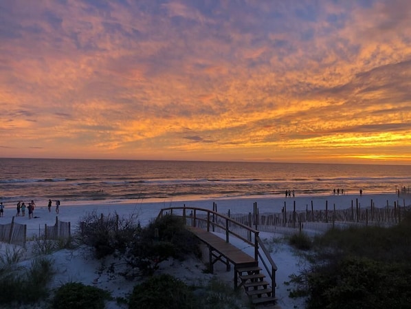 The Sunlounger beach sunset view from King Master Suite covered deck.