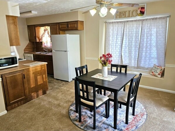 dining area and full kitchen