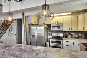 Kitchen with all appliances.