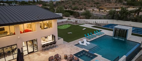 Luxury amenities featuring pool, spa, firepit, putting green, & sports court