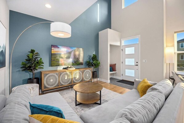 View of front door and main level living room