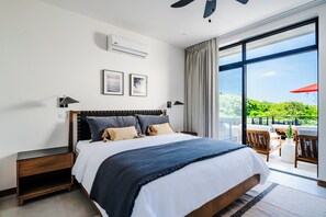 #1. Step into our inviting ground-floor bedroom, offering nature views and direct terrace access