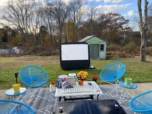 setting up for movie night under the stars.