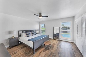King master bedroom with Florida room access and ensuite bathroom