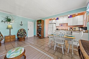 Living room and the kitchen.
Two comfortable swivel rocking chairs